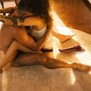 A couple hugging each other, Man.Wand Edgy Velvet Red is lying around. 